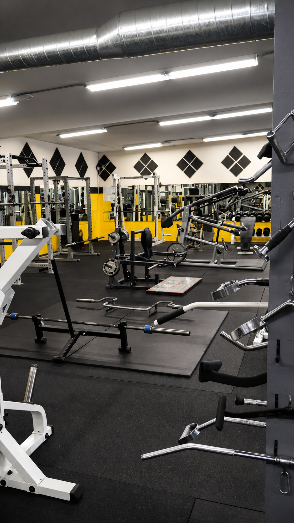 Power racks and free weight platforms at Madtown Fitness